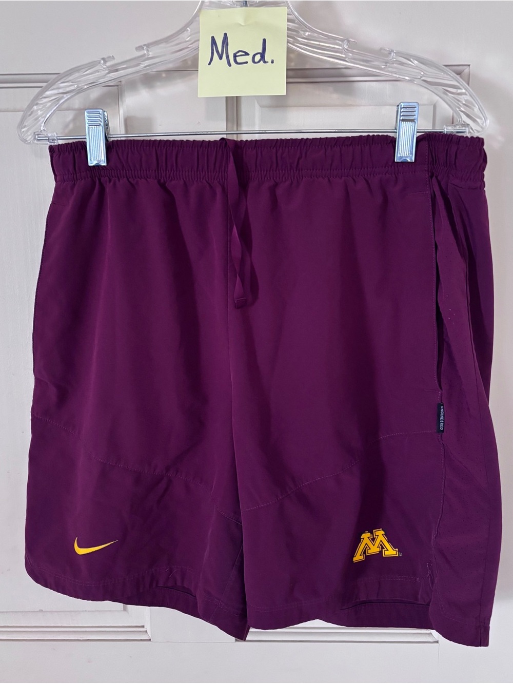 Nike Maroon Athletic Shorts with Gold Accents